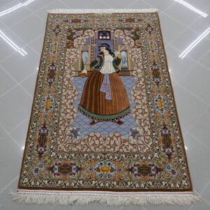 tappeto isfahan con la figura della donna vestita del periodo ghajar