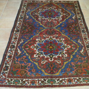 tappeto persiano bakhtiari da salotto azzurro e rosso