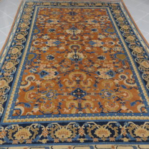 tappeto cinese da sala color salmone e blu