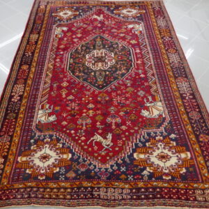tappeto persiano gashgai fondo rosso mattone da sala