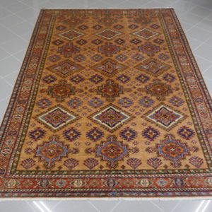 tappeto kazak da sala color albicocca