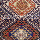 Tappeto caucasico Mogan di vecchia manifattura, lana su lana e annodato a mano con medaglioni geometrici tradizionali. Dimensioni 260x132 cm. Autentico tappeto caucasico decorativo.