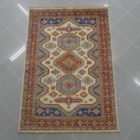 piccolo tappeto kazak fondo chiaro