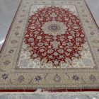 tappeto persiano raffinato Isfahan da salotto fondo rosso firmato