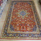tappeto persiano kum fondo arancio da salotto