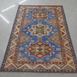 tappeto orientale kazak fondo celeste da salotto