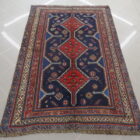 antico tappeto persiano lori da salotto fondo blu e rosso geometrico