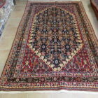 tappeto persiano gashgai kashkuli motivo herati fondo blu e rosso