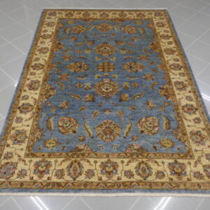 tappeto orientale ziegler fondo azzurro da salotto