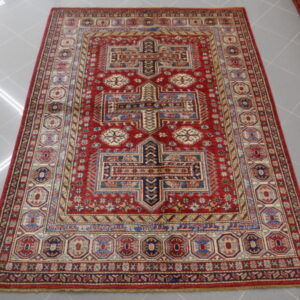 tappeto orientale kazak fondo rosso da salotto moderno