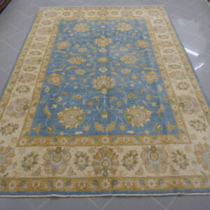 tappeto orientale decorativo da sala fondo azzurro