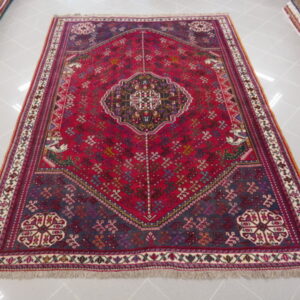 tappeto persiano gashgai fondo rosso da salotto