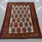 antico tappeto karakalpak uzbeco fondo avorio da salotto