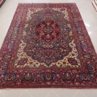 antico tappeto persiano dorokhsh da salotto fondo verde