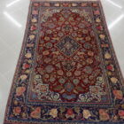 antico tappeto persiano keshan da salotto fondo rosso
