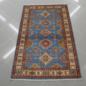 piccolo tappeto orientale kazak fondo azzurro da salotto