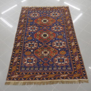 antico tappeto caucaso shirvan fondo blu da salotto