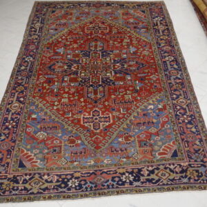 antico tappeto persiano heriz fondo rosso