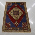 piccolo tappeto antico turco tashpinar rosso e blu