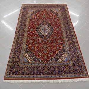 tappeto persiano keshan classico fondo rosso da salotto