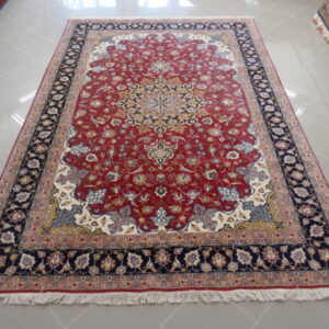 tappeto persiano tabriz molto elegante fondo rosso da salotto