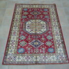 tappeto orientale kazak da salotto fondo rosso