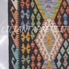 Kilim afghano fatto a mano in lana su lana, dimensioni 298x212 cm. Grande tappeto multicolore con disegno geometrico, ideale per ambienti moderni e spaziosi.