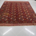 antico tappeto turcomanno tekke fondo rosso da salotto