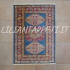 scendiletti kazak fondo azzurro geometrici circa 90x60 cm