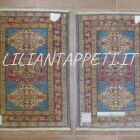 scendiletti kazak fondo azzurro geometrici circa 90x60 cm