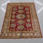 tappeto orientale kazak fondo rosso da salotto moderno