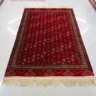 tappeto bukhara turcomanno yomut fondo rosso
