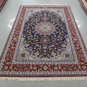 tappeto persiano isfahan firmato misto seta fondo blu da sala