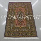 piccolo tappeto persiano kum con il medaglione fondo rosa antico e verde 156x106 cm
