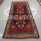 Antico tappeto caucasico Daghestan con tre losanghe rosse su fondo blu, lana su lana, inizio XX secolo 353x145 cm