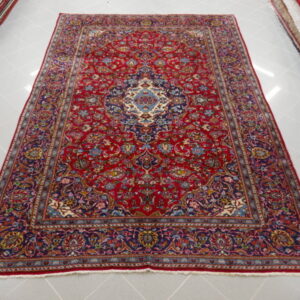 tappeto persiano keshan classico fondo rosso da salotto