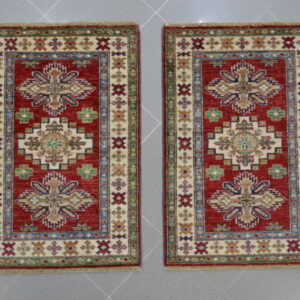 Scendiletti afghani orientali kazak rossi disegno geometrico