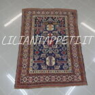 Tappeto caucasico Perepedil lana su lana fondo blu 168x120 cm