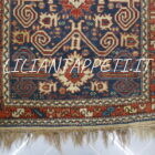 Piccolo tappeto caucasico Perepedil lana su lana fondo blu 148x90 cm