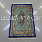 piccolo tappeto persiano kum tutto seta fondo azzurro verde 115x75 cm